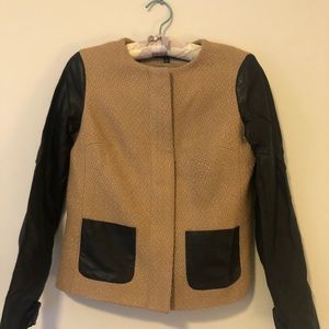 Camel coat with leather sleeves